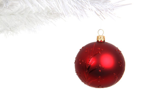 christmas ball hanging on tree on white