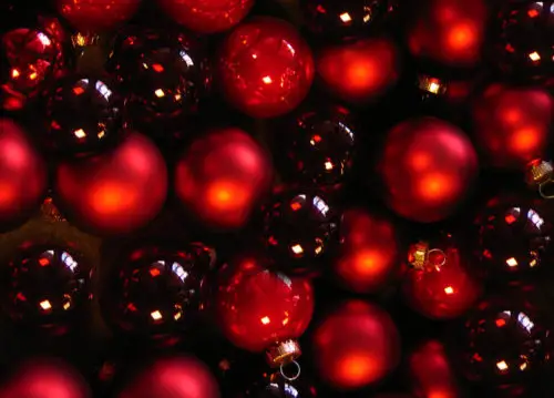 many red christmas balls background image