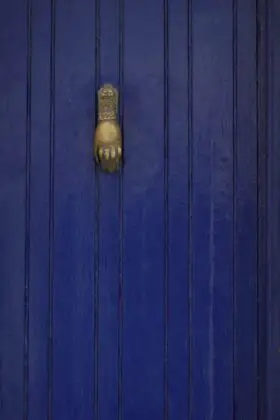 Old Blue Door With Bronze Door Knocker Free Stock Photo