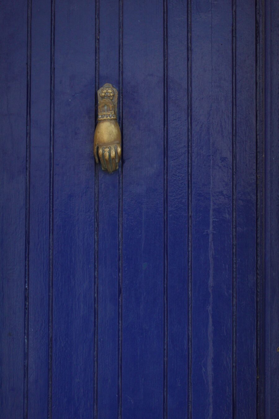 old blue door with bronze door knocker free stock photo