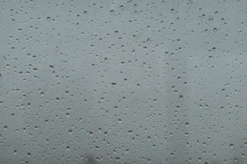 Raindrops on glass window background texture. Free stock photo you can use even commercially.