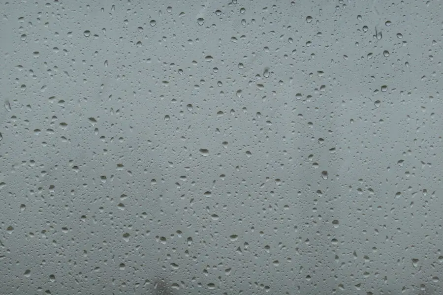 Rain drops on glass window background texture. Free stock photo you can use even commercially.