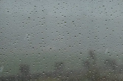 Raindrops on glass window background texture. Free stock photo you can use even commercially.